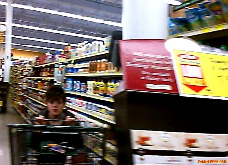Kent Acme; Wierd girl sitting in shopping Cart